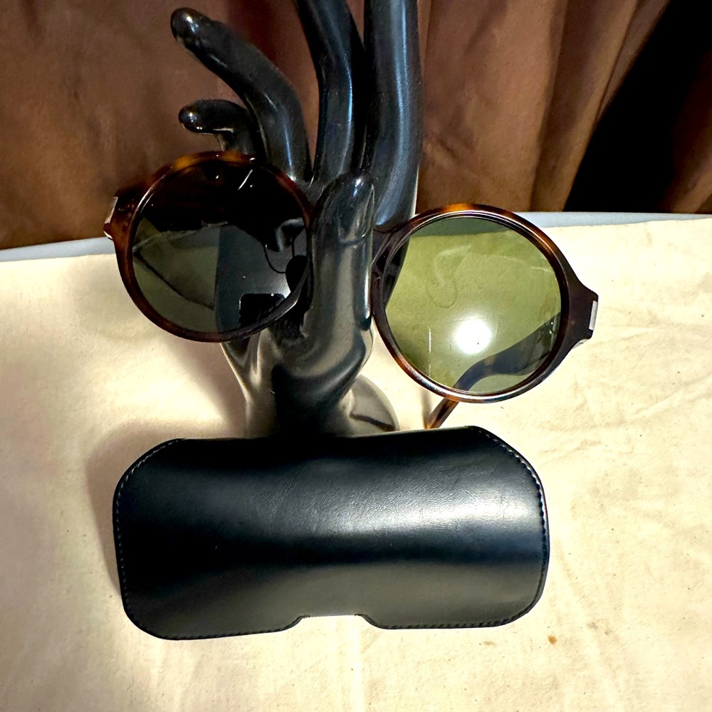 YSL sunglasses with case. In excellent condition. No callouts.